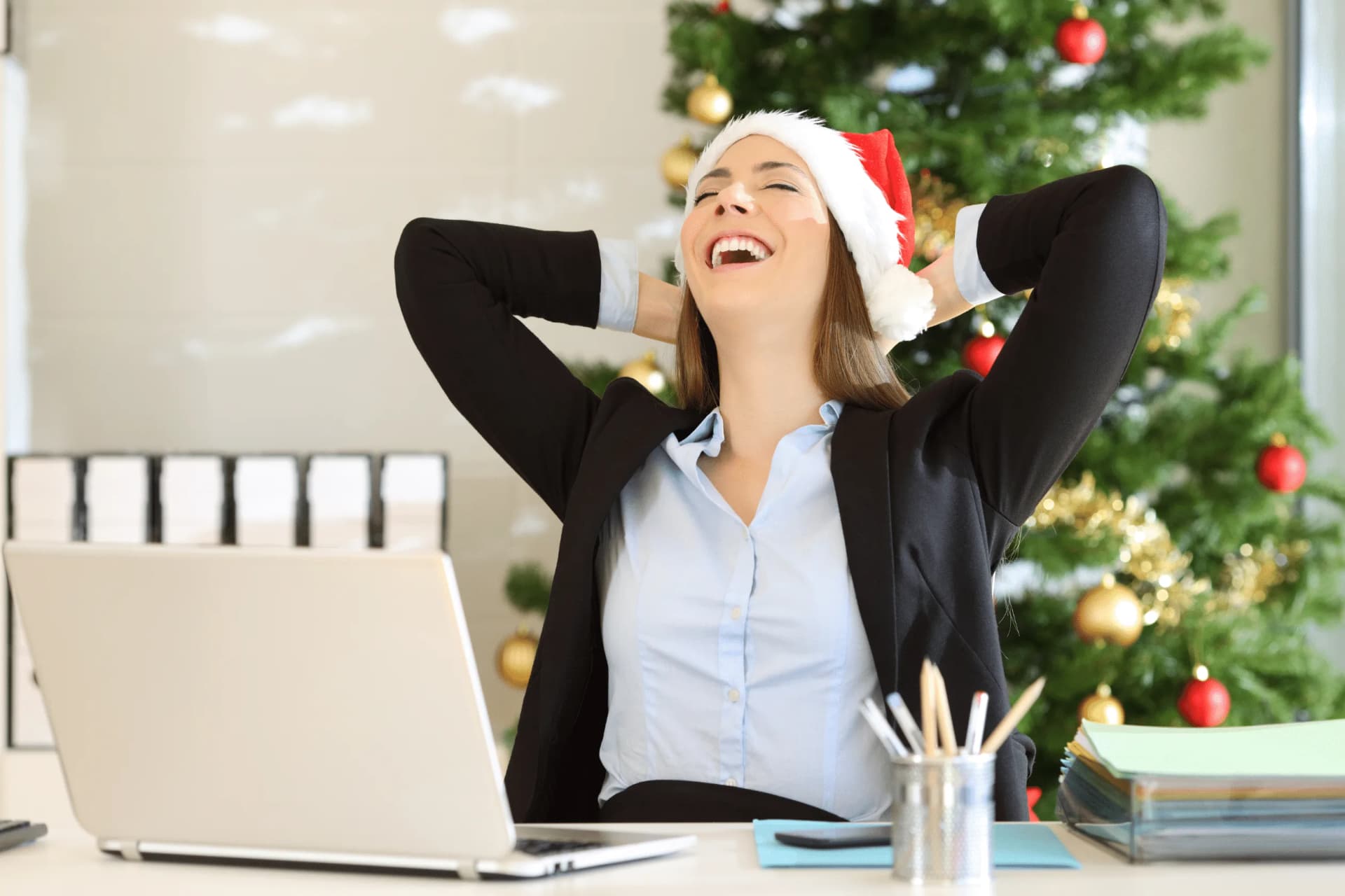 Virtual Assistant helping with holiday planning including gifts, travel, and festive decorations
