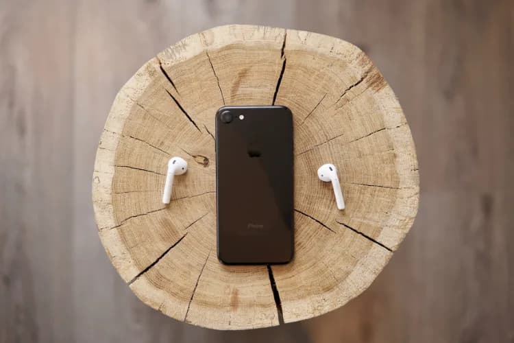 iPhone displaying productivity apps for task management, fitness tracking, and organization