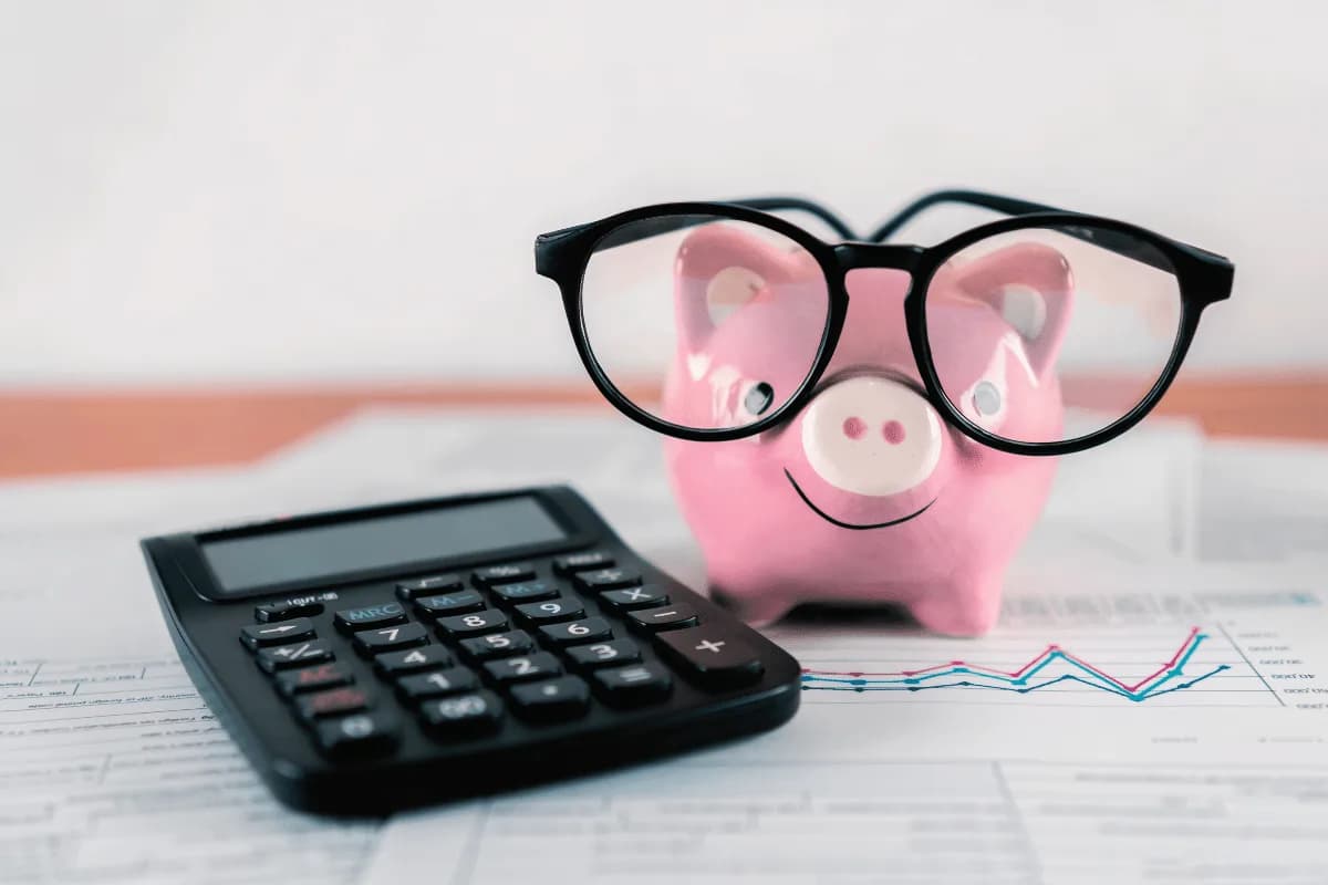Business owner comparing Virtual Assistant pricing options and budgeting for administrative support