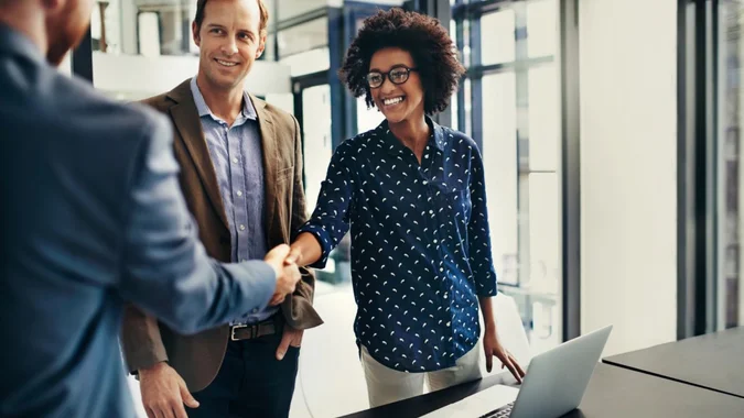Professional team building trust and rapport through collaboration and open communication
