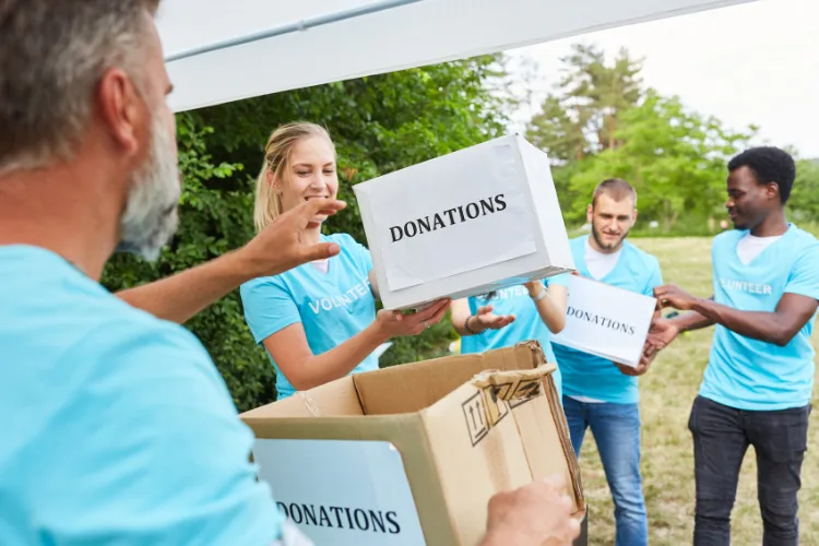 Non-profit team member working with virtual assistant to manage donor relations and fundraising
