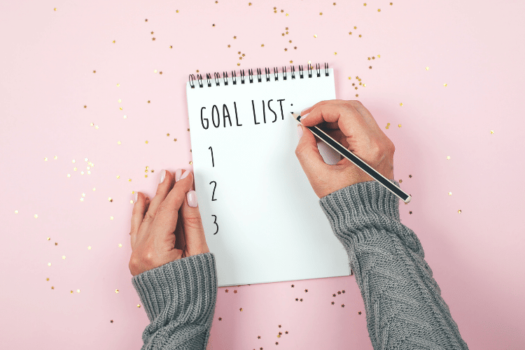 Entrepreneur overcoming goal achievement roadblocks with coaching and virtual assistant support