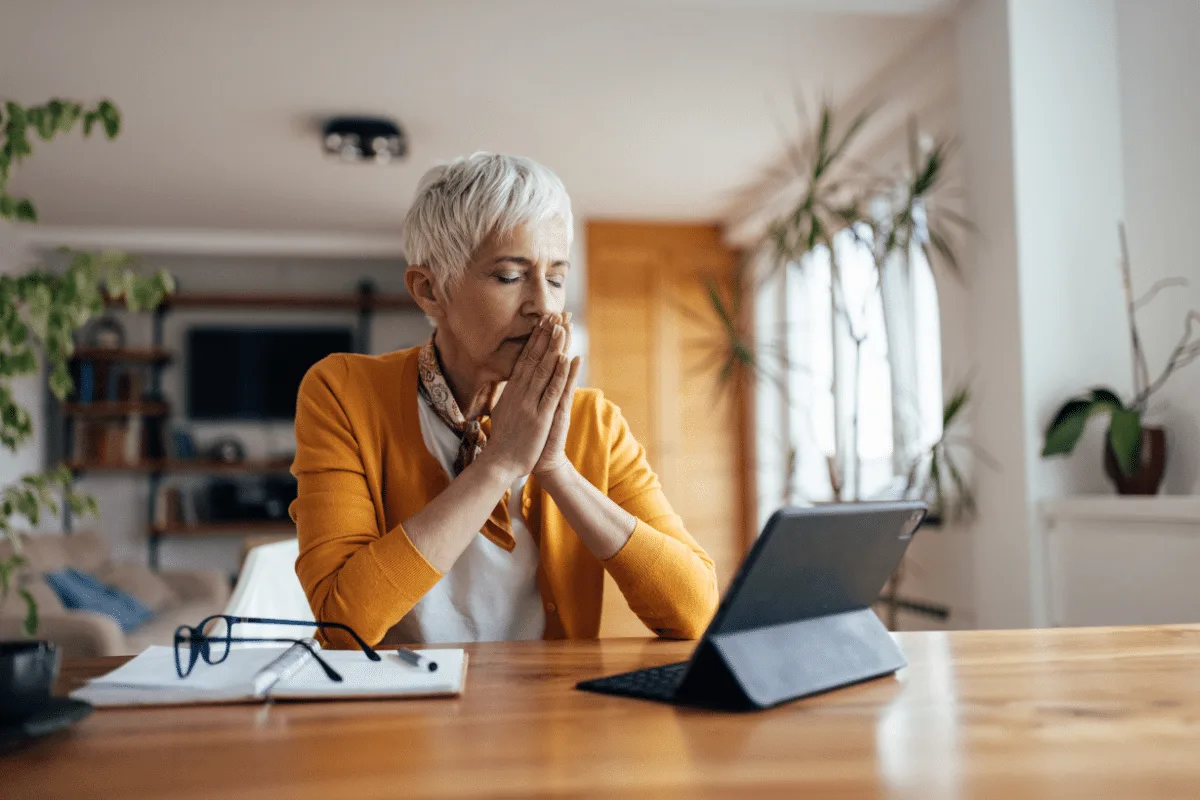 Professional taking a mindful pause to boost productivity and prevent burnout in business