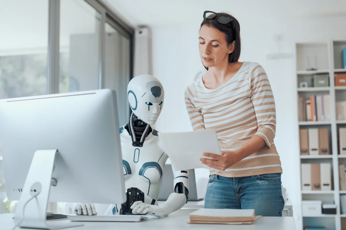 Human professional completing final mile tasks that AI cannot automate in business workflows