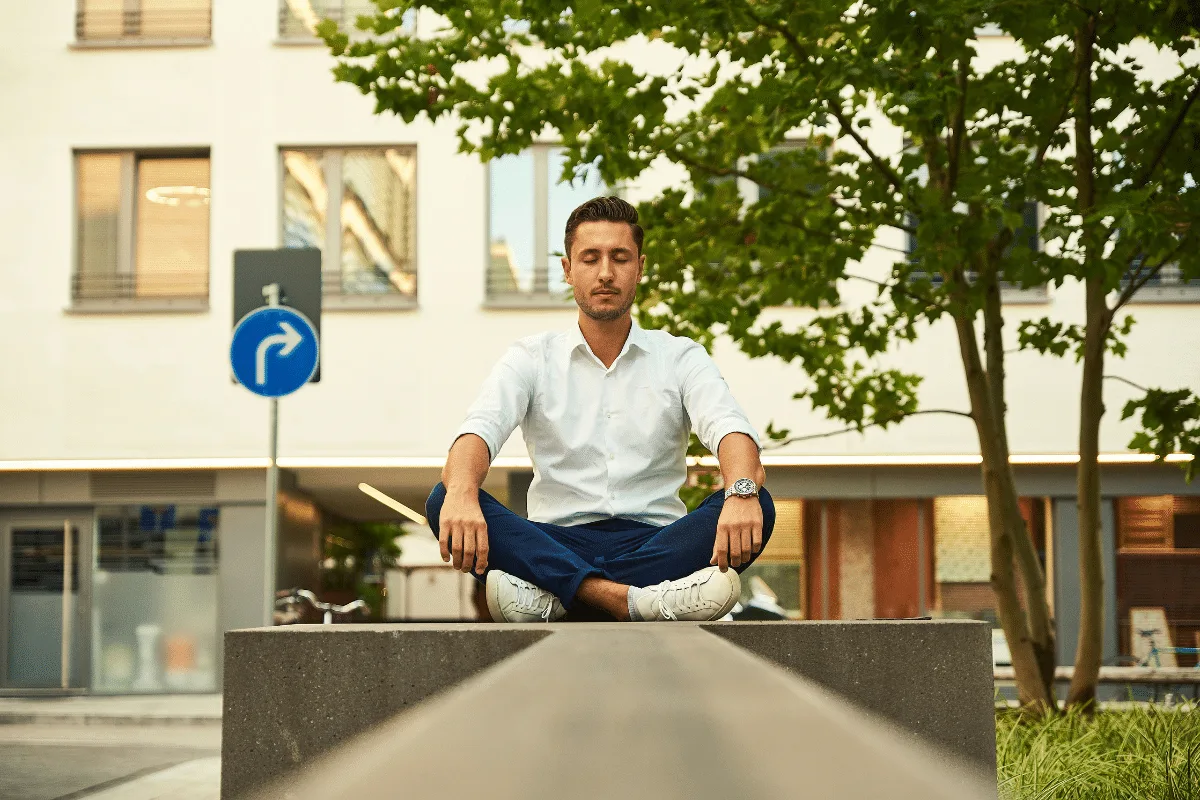 Business founder practicing meditation for stress relief and building mental resilience
