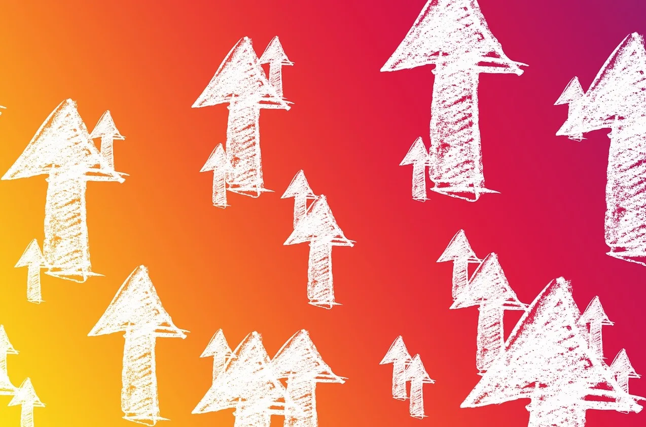 Entrepreneur reviewing business growth strategies and metrics for Q4 planning